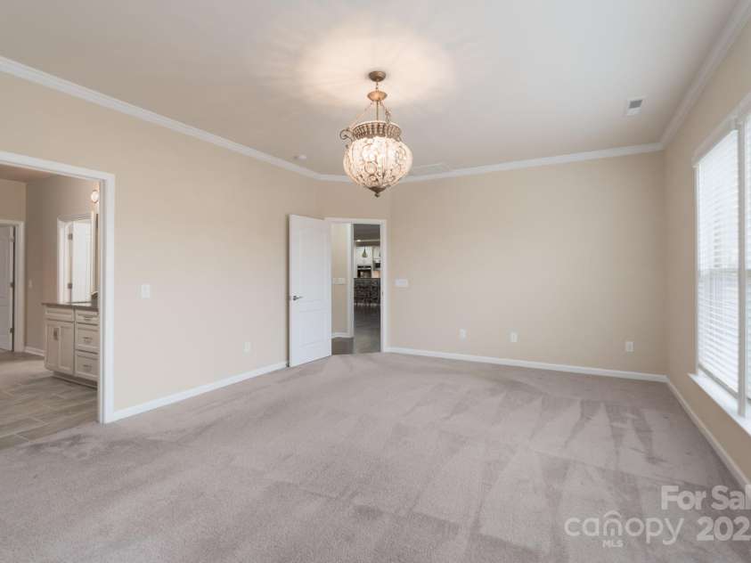 3087 Bartlett Street, Fort Mill, SC 29715.  MLS# CAR4177276, YatesRealty ID 14730. Primary Bedroom on Main