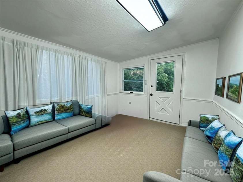 5381 State HWY 197 S Highway, Burnsville, NC 28714.  MLS# CAR4248281, YatesRealty ID 14736. Bonus Room