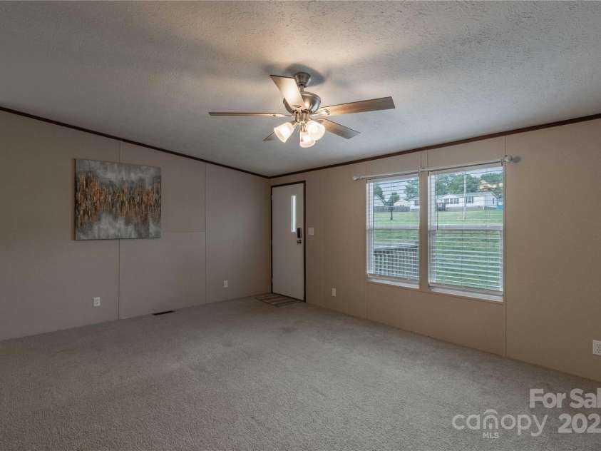 105 Peridot Drive, Statesville, NC 28625.  MLS# CAR4258509, YatesRealty ID 14739. Living Room