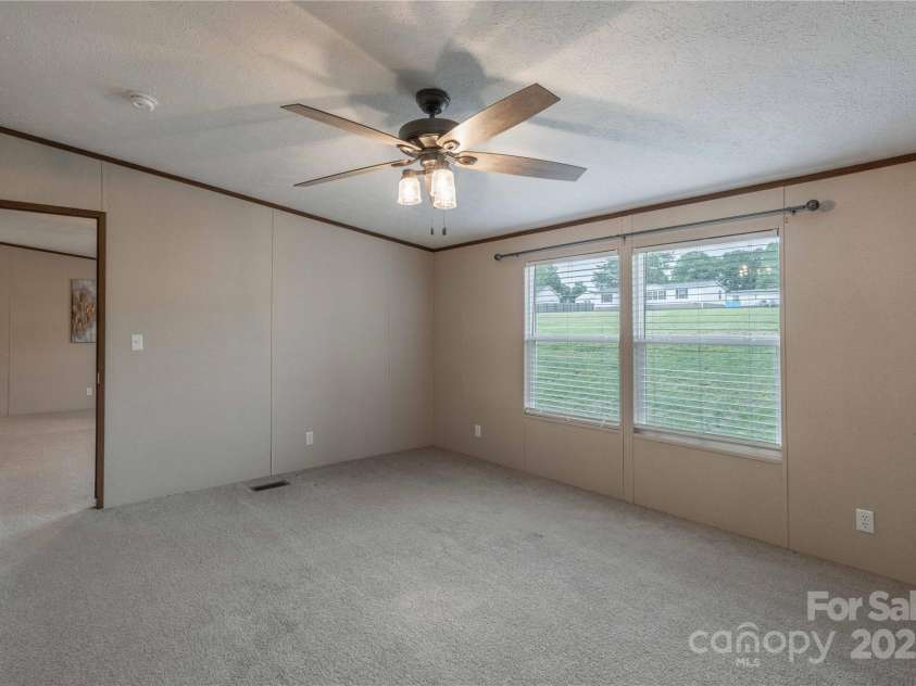 105 Peridot Drive, Statesville, NC 28625.  MLS# CAR4258509, YatesRealty ID 14739. Primary Suite