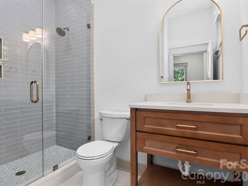 1617 Parson Street, Charlotte, NC 28205.  MLS# CAR4410956, YatesRealty ID 14739. FIRST FLOOR BATHROOM