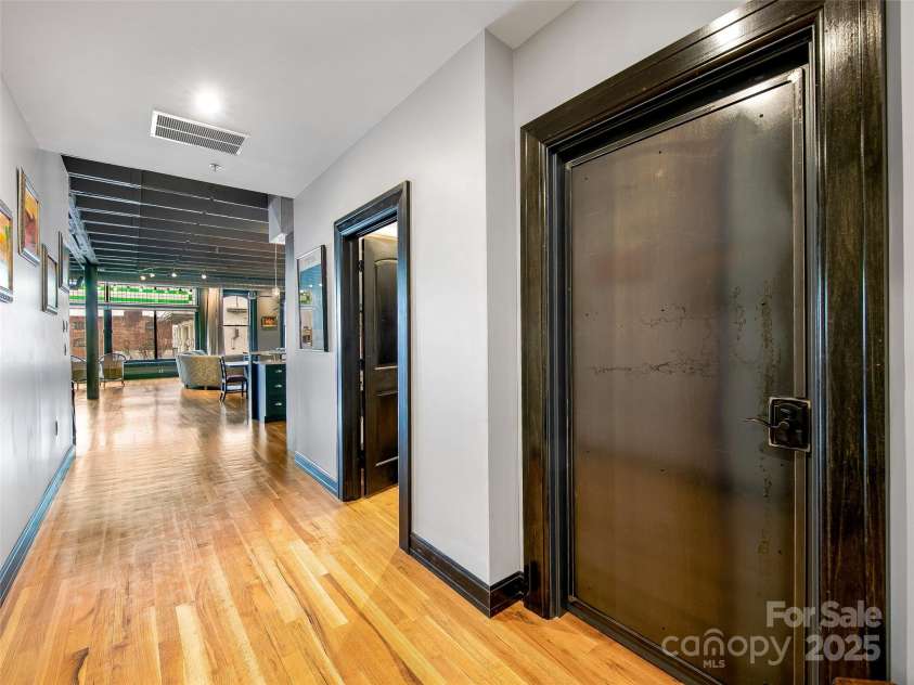 10 Patton Avenue, Asheville, NC 28801.  MLS# CAR4178413, YatesRealty ID 1474. Apartment wide hallway