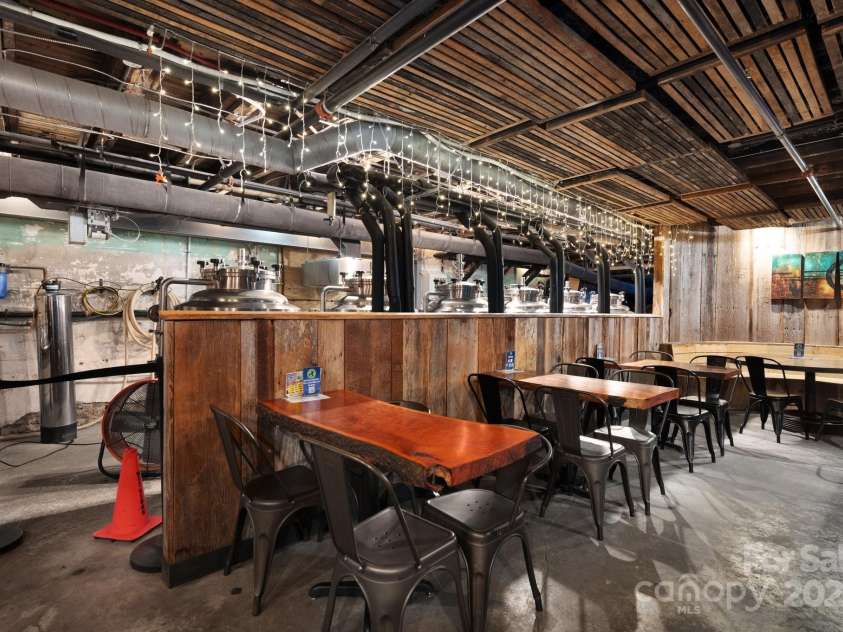 10 Patton Avenue, Asheville, NC 28801.  MLS# CAR4178413, YatesRealty ID 1474. Brewery seating