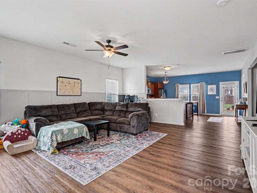 2419 Impatien Drive, Charlotte, NC 28215.  MLS# CAR4355109, YatesRealty ID 14740. Open living room