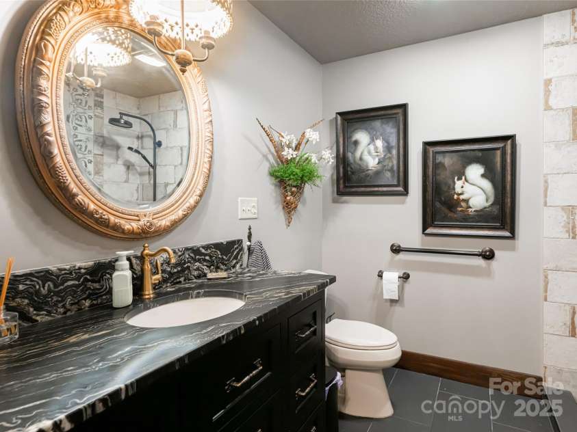 704 Fleetwood Plaza, Hendersonville, NC 28739.  MLS# CAR4246743, YatesRealty ID 14741. Guest full bathroom