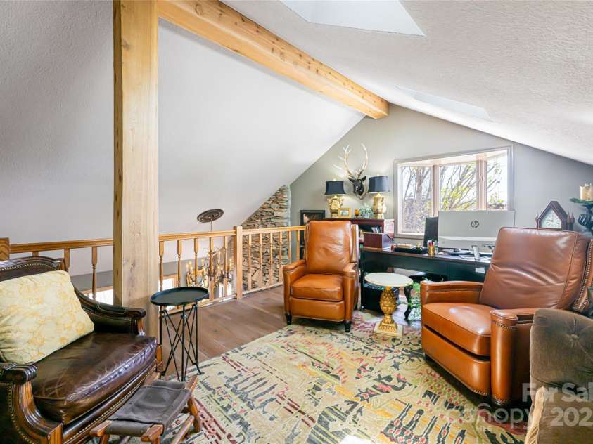 704 Fleetwood Plaza, Hendersonville, NC 28739.  MLS# CAR4246743, YatesRealty ID 14741. Loft wit skylights