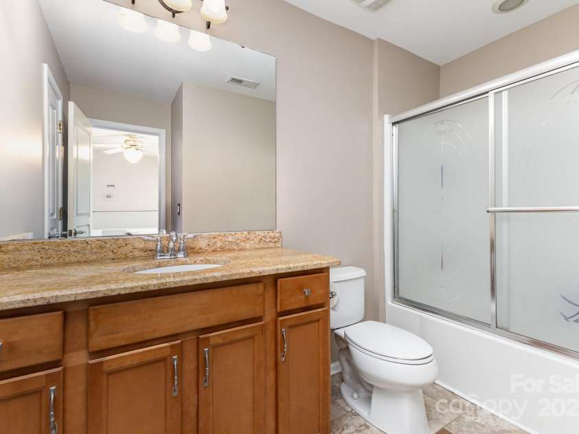 10202 Alouette Drive, Waxhaw, NC 28173.  MLS# CAR4250954, YatesRealty ID 14743. The ensuite bathroom provides convenience and privacy to the bedroom