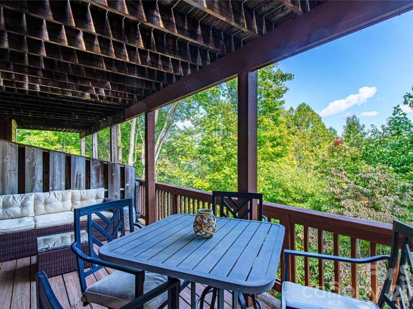 73 Toxaway Views Drive, Lake Toxaway, NC 28747.  MLS# CAR4430487, YatesRealty ID 14748. Back deck