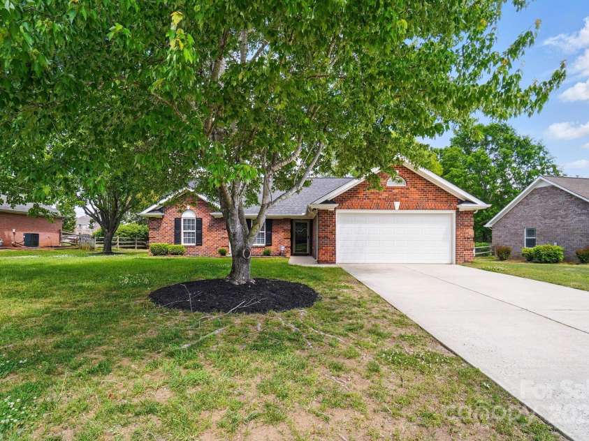 8309 Emily Drive, Harrisburg, NC 28075.  MLS# CAR4254903, YatesRealty ID 1475. 