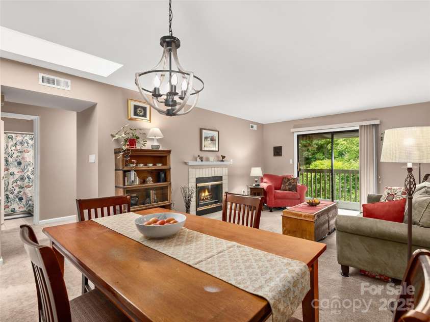 304 Abbey Circle, Asheville, NC 28805.  MLS# CAR4260740, YatesRealty ID 14756. Dining Area looking into Living Area