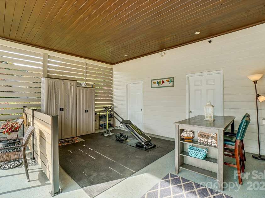 9542 Riviera Drive, Sherrills Ford, NC 28673.  MLS# CAR4298119, YatesRealty ID 14759. Large covered carport. Can be used for cars or extra hang out areas and gym space.