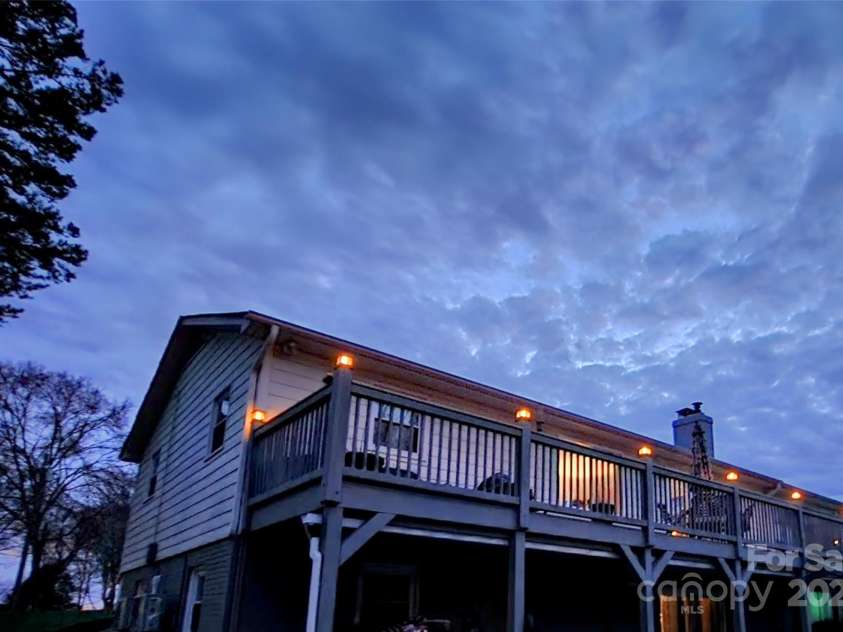 9542 Riviera Drive, Sherrills Ford, NC 28673.  MLS# CAR4298119, YatesRealty ID 14759. Per deck was wonderful view of the lake. Covered patio underneath when you need some shade. 