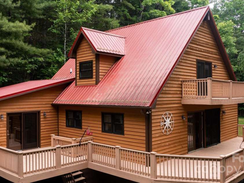 350 Stagecoach Road, Zirconia, NC 28790.  MLS# CAR4262854, YatesRealty ID 14765. Check out all the deck space