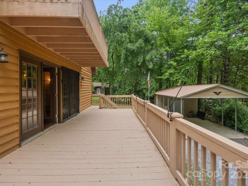 350 Stagecoach Road, Zirconia, NC 28790.  MLS# CAR4262854, YatesRealty ID 14765. Check out this expansive Deck