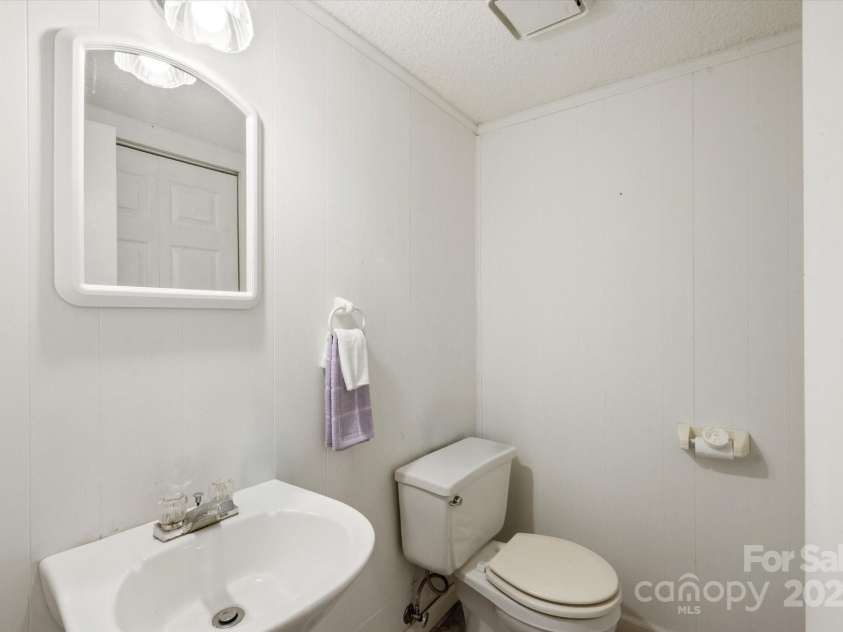 350 Stagecoach Road, Zirconia, NC 28790.  MLS# CAR4262854, YatesRealty ID 14765. Half Bath in Basement