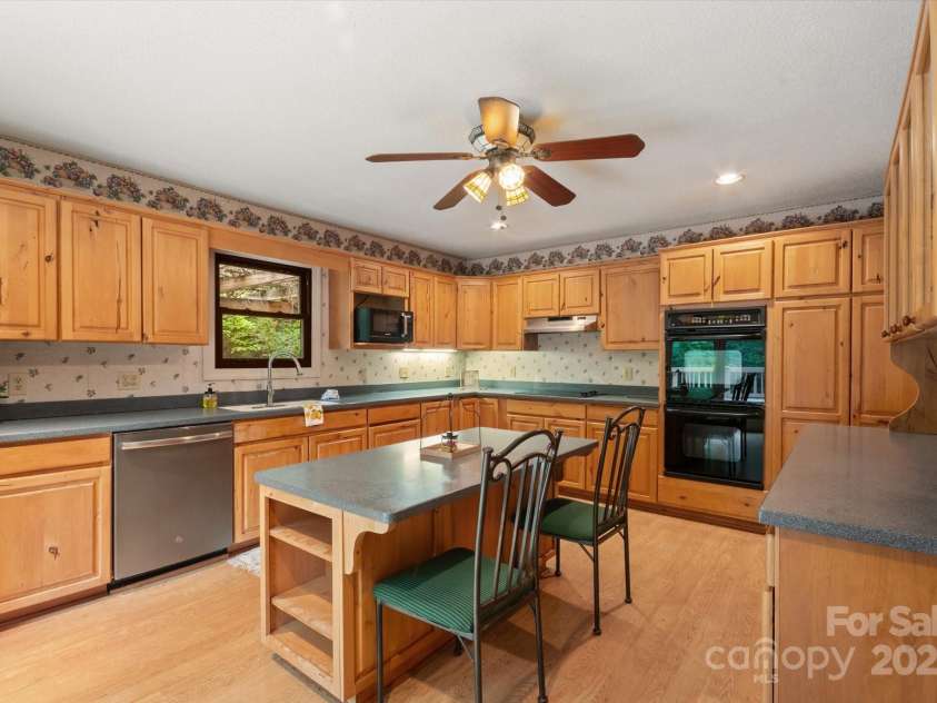 350 Stagecoach Road, Zirconia, NC 28790.  MLS# CAR4262854, YatesRealty ID 14765. HUGE kitchen