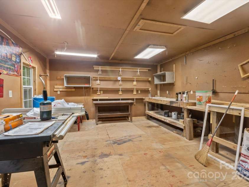 350 Stagecoach Road, Zirconia, NC 28790.  MLS# CAR4262854, YatesRealty ID 14765. Inside of Workshop