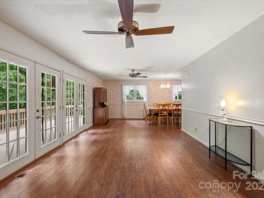 350 Stagecoach Road, Zirconia, NC 28790.  MLS# CAR4262854, YatesRealty ID 14765. Living Room looking toward Dining Space