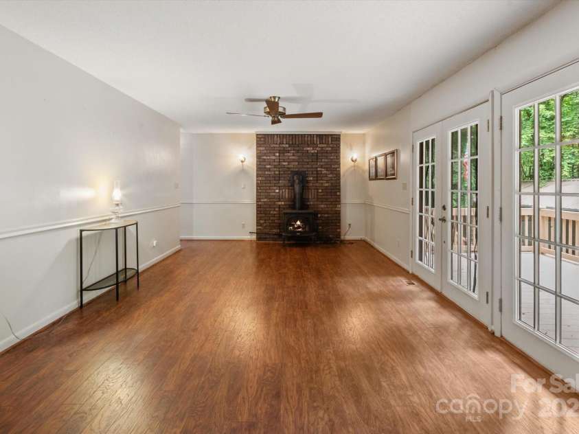 350 Stagecoach Road, Zirconia, NC 28790.  MLS# CAR4262854, YatesRealty ID 14765. Living Room with fireplace