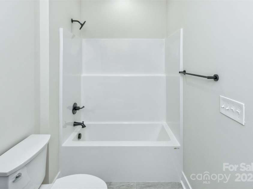 440 Old Buckeye Cove Road, Swannanoa, NC 28778.  MLS# CAR4262695, YatesRealty ID 14766. 2nd floor full bath.