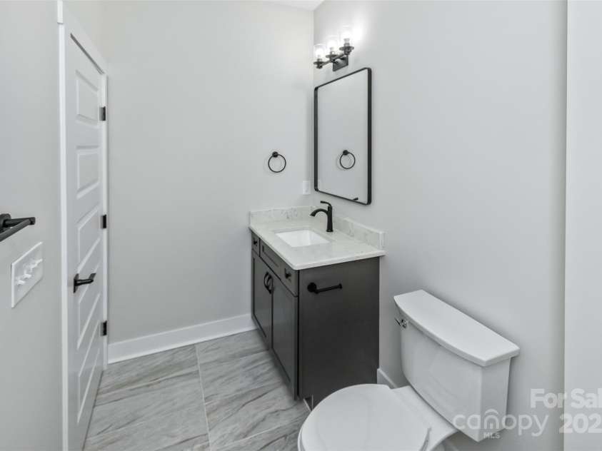 440 Old Buckeye Cove Road, Swannanoa, NC 28778.  MLS# CAR4262695, YatesRealty ID 14766. 2nd floor full bath.