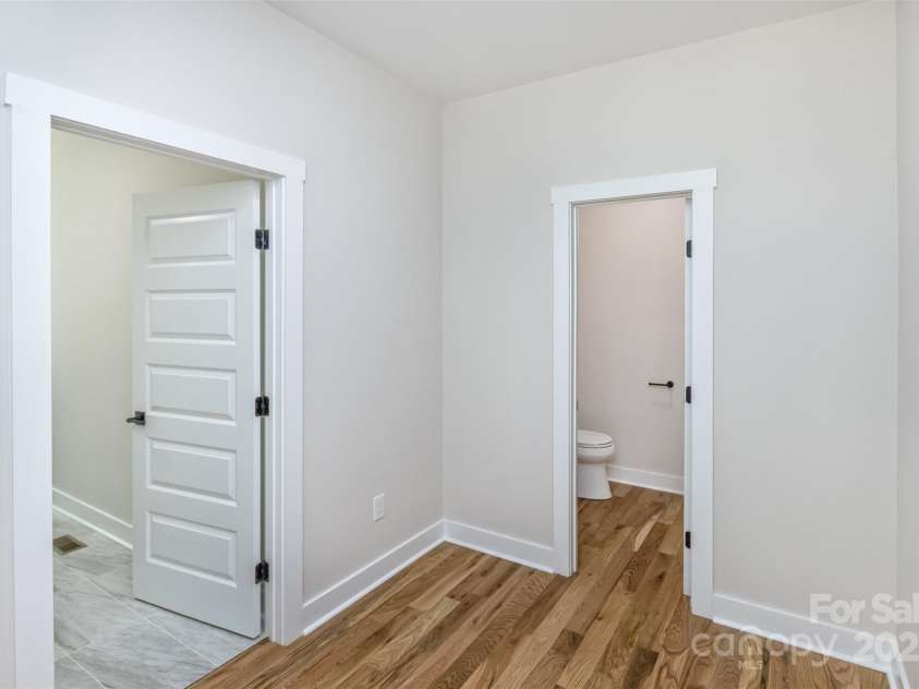 440 Old Buckeye Cove Road, Swannanoa, NC 28778.  MLS# CAR4262695, YatesRealty ID 14766. Mudroom off of porch.