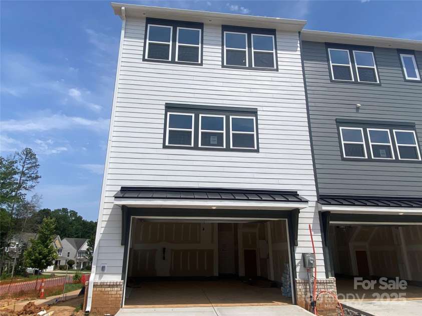 416 Nathaniel Way, Charlotte, NC 28213.  MLS# CAR4252856, YatesRealty ID 14767. Garage Exterior