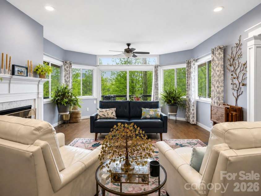 198 Brooks Branch Road, Leicester, NC 28748.  MLS# CAR4342516, YatesRealty ID 14773. Living room opens to deck