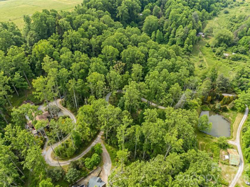 198 Brooks Branch Road, Leicester, NC 28748.  MLS# CAR4342516, YatesRealty ID 14773. Privacy and nature