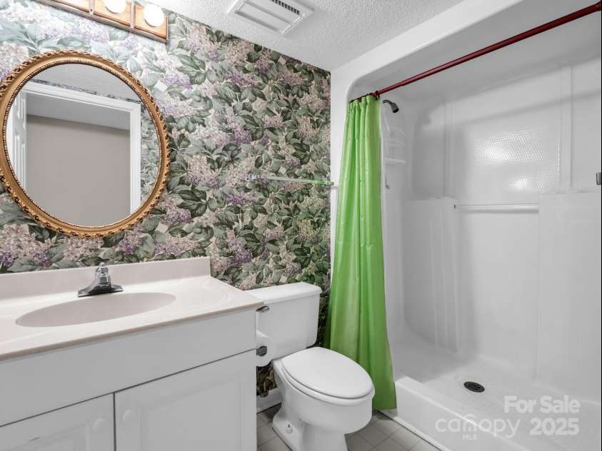 31 Hunting Country Trail, Tryon, NC 28782.  MLS# CAR4240091, YatesRealty ID 14777. Full bath in basement.