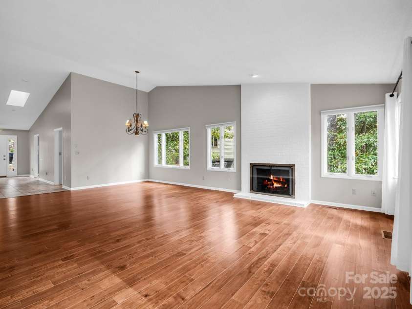 31 Hunting Country Trail, Tryon, NC 28782.  MLS# CAR4240091, YatesRealty ID 14777. LR & DR, looking towards front entry