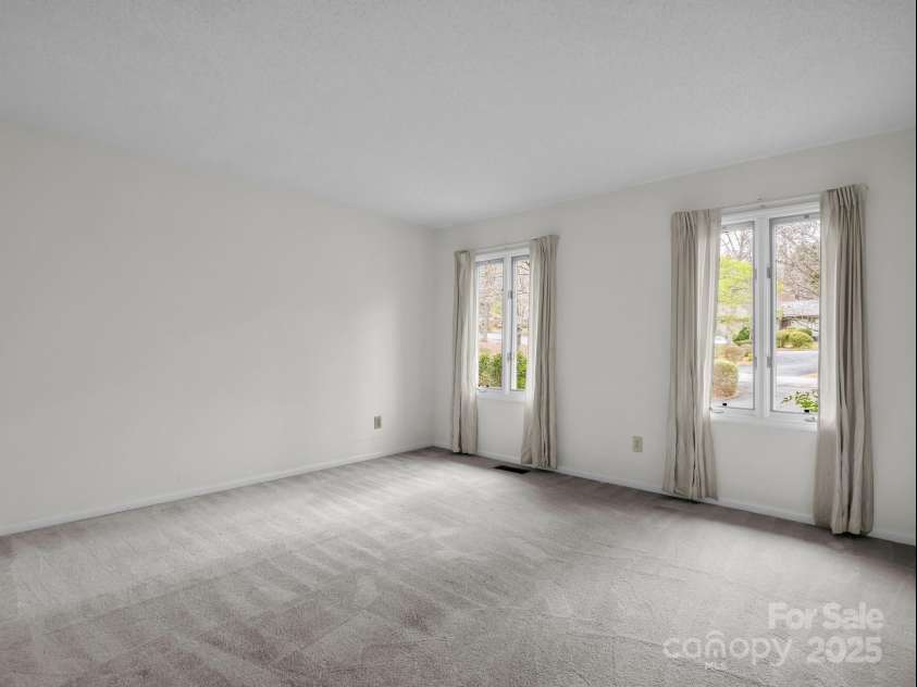 31 Hunting Country Trail, Tryon, NC 28782.  MLS# CAR4240091, YatesRealty ID 14777. Main Level Guest Bedroom