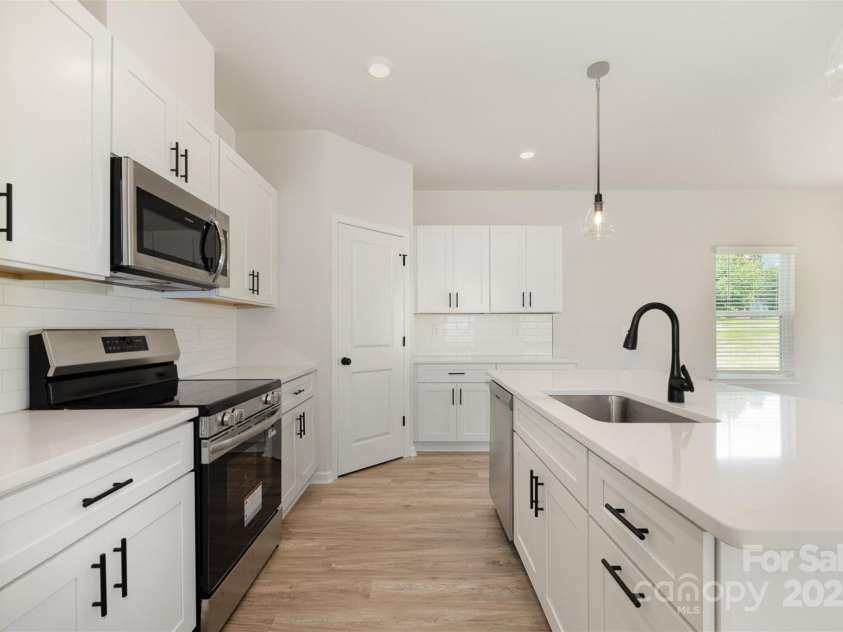 2023 Sadler Woods Lane, Charlotte, NC 28214.  MLS# CAR4263129, YatesRealty ID 14781. Gorgeous Island. Representational Photo.