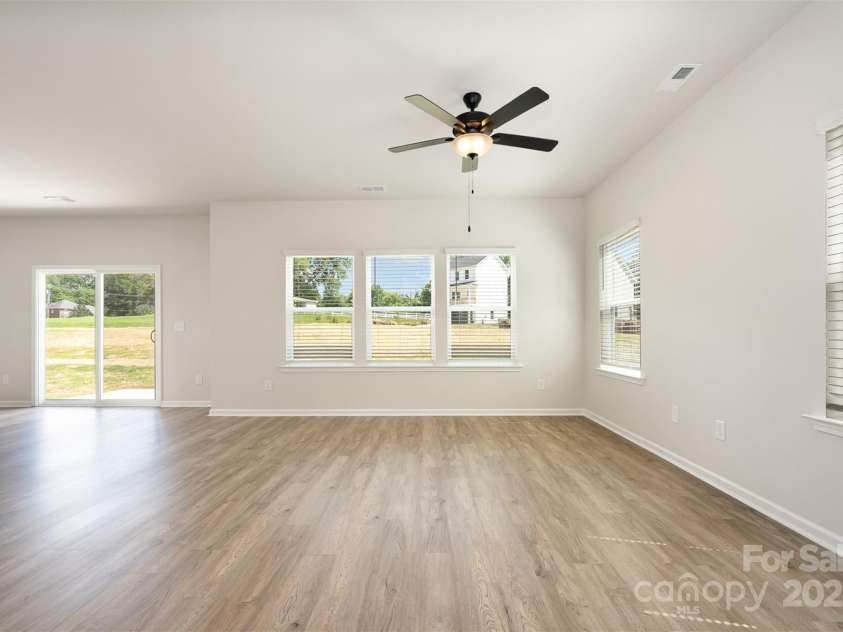 2023 Sadler Woods Lane, Charlotte, NC 28214.  MLS# CAR4263129, YatesRealty ID 14781. Living area. Representational Photo.