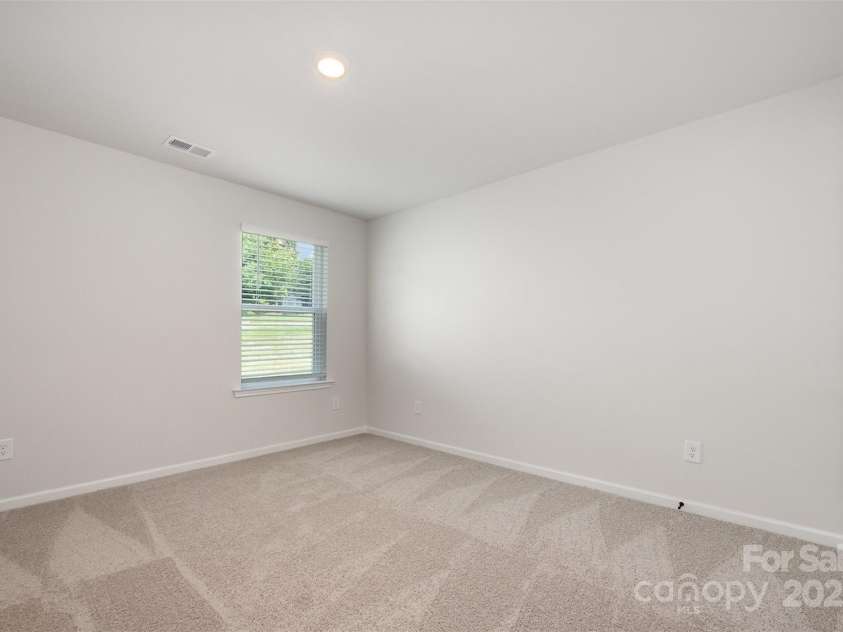 2023 Sadler Woods Lane, Charlotte, NC 28214.  MLS# CAR4263129, YatesRealty ID 14781. Spare Bedroom 2. Representational Photo.