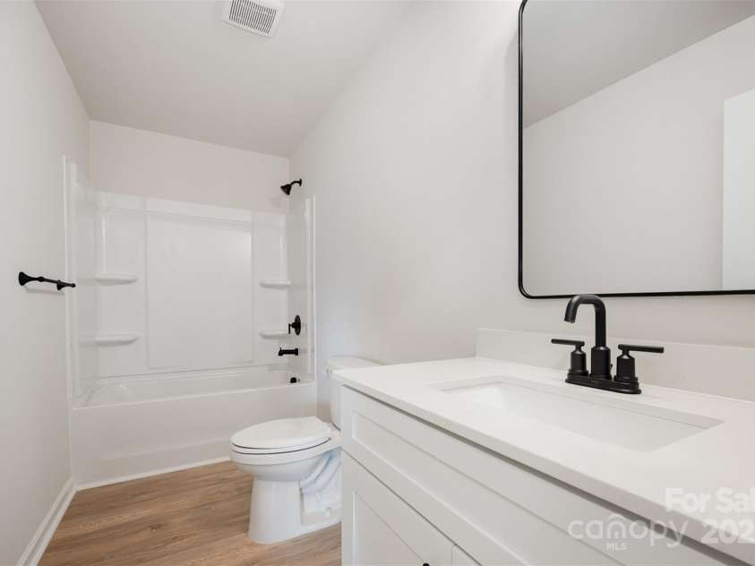 2023 Sadler Woods Lane, Charlotte, NC 28214.  MLS# CAR4263129, YatesRealty ID 14781. Spare full bathroom. Representational Photo.