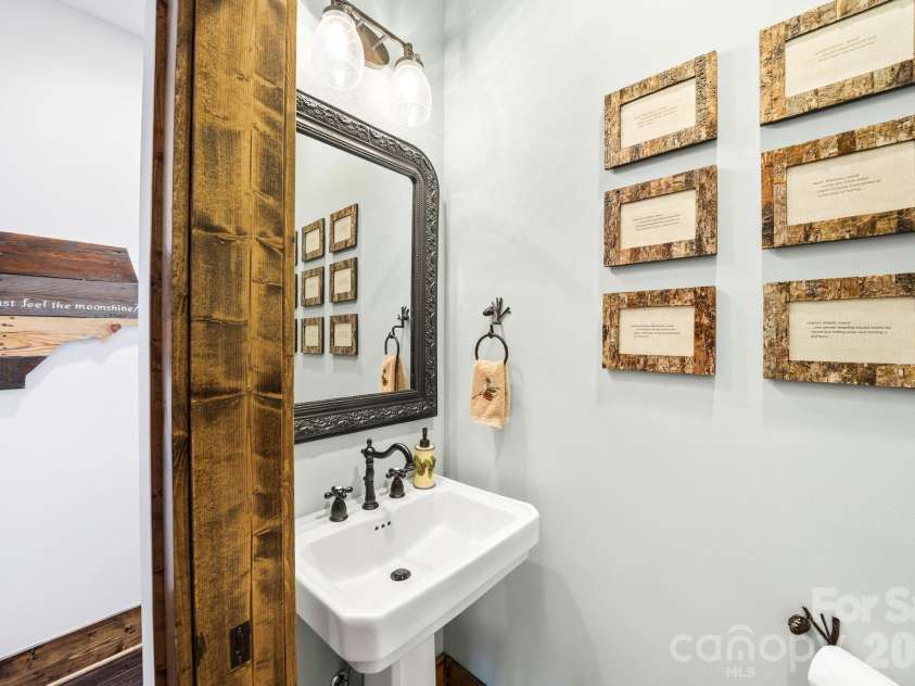 23 Eagle Park Circle, Banner Elk, NC 28604.  MLS# CAR4373835, YatesRealty ID 14781. Half-bath, main level