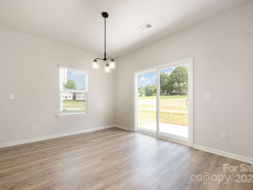 2031 Sadler Woods Lane, Charlotte, NC 28214.  MLS# CAR4263133, YatesRealty ID 14783. Dining area. Representational Photo.