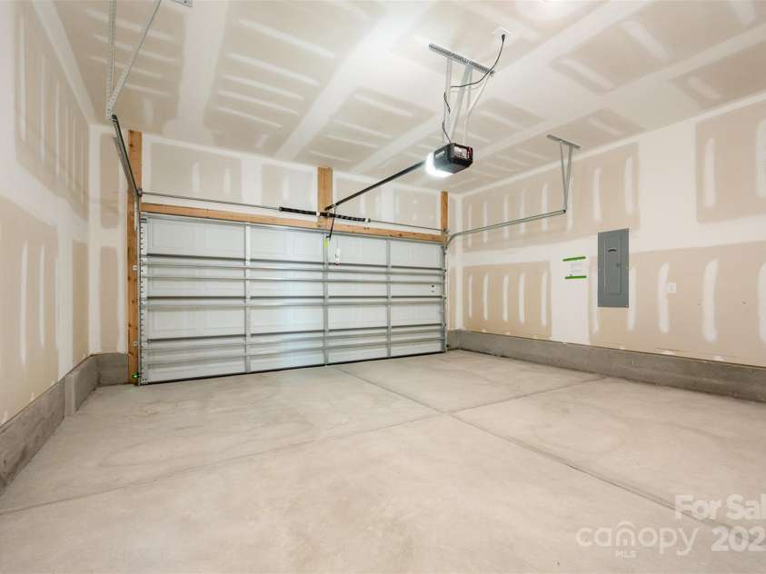 2031 Sadler Woods Lane, Charlotte, NC 28214.  MLS# CAR4263133, YatesRealty ID 14783. Double-car garage. Representational Photo.