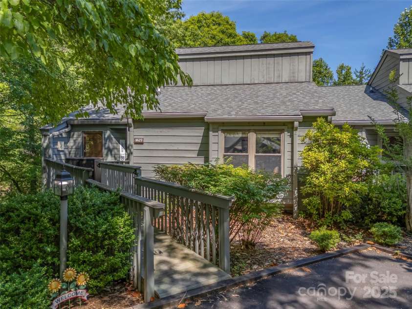 128 Quail Run Court, Lake Lure, NC 28746.  MLS# CAR4262944, YatesRealty ID 14789. 