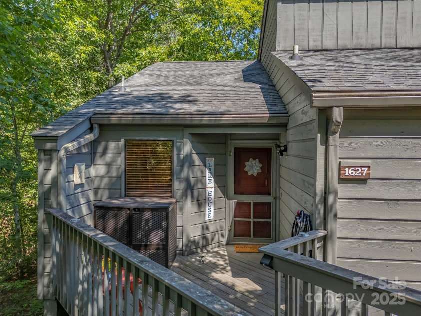 128 Quail Run Court, Lake Lure, NC 28746.  MLS# CAR4262944, YatesRealty ID 14789. 