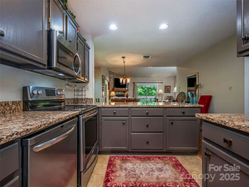 128 Quail Run Court, Lake Lure, NC 28746.  MLS# CAR4262944, YatesRealty ID 14789. 