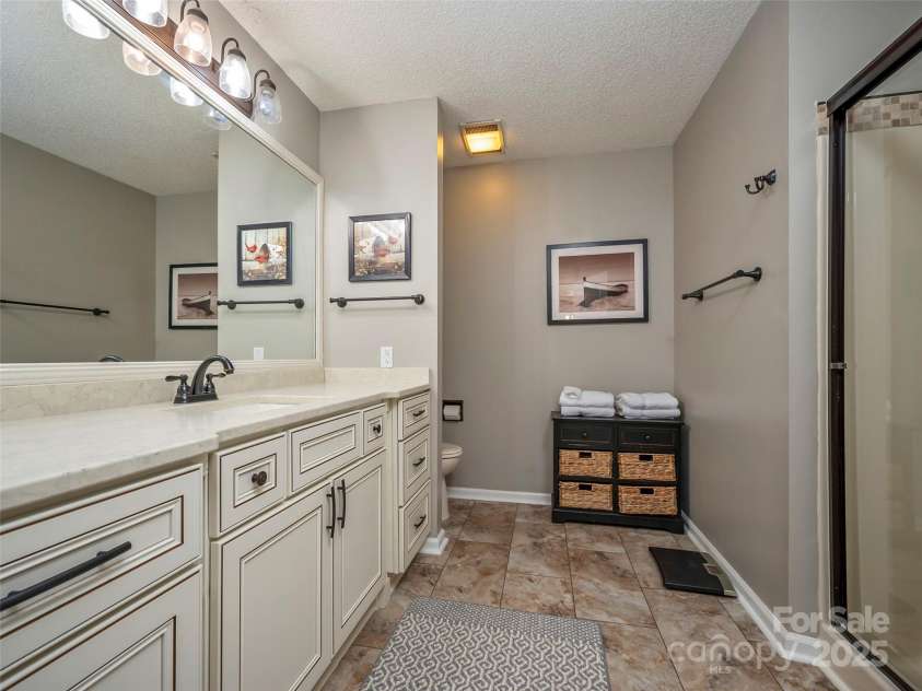 128 Quail Run Court, Lake Lure, NC 28746.  MLS# CAR4262944, YatesRealty ID 14789. 