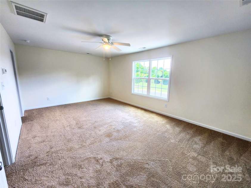 2300 Grayson Parkway, Monroe, NC 28110.  MLS# CAR4263227, YatesRealty ID 14792. Spacious Primary Bedroom