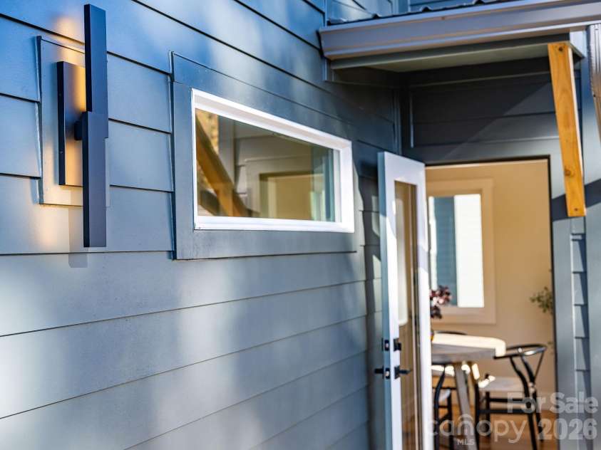 67 Crestfield Avenue, Asheville, NC 28804.  MLS# CAR4351848, YatesRealty ID 14793. Beautiful exterior lighting