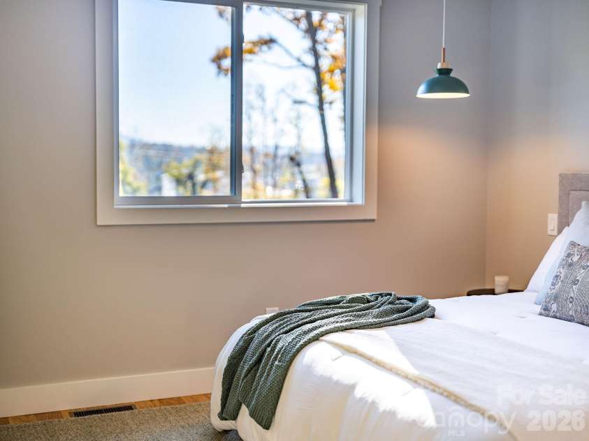 67 Crestfield Avenue, Asheville, NC 28804.  MLS# CAR4351848, YatesRealty ID 14793. Custom Pendants, sleep above it all