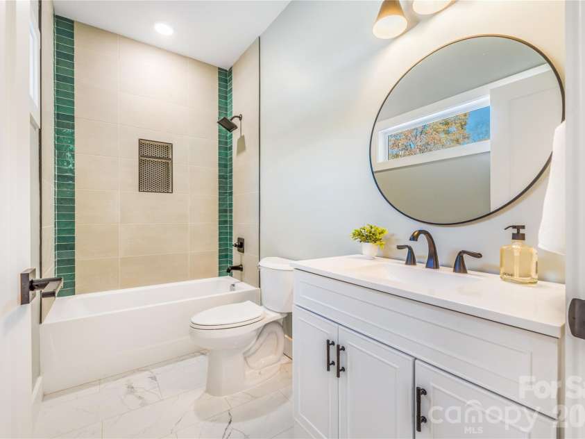 67 Crestfield Avenue, Asheville, NC 28804.  MLS# CAR4351848, YatesRealty ID 14793. Tub with great tile installation