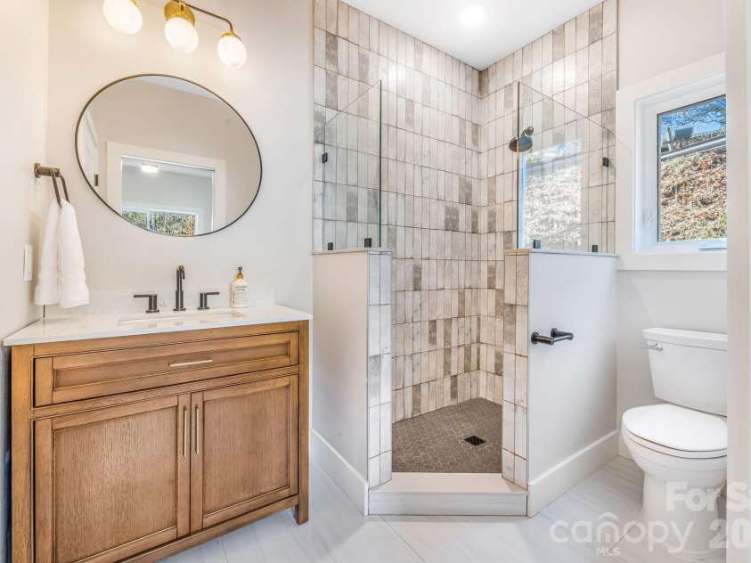 67 Crestfield Avenue, Asheville, NC 28804.  MLS# CAR4351848, YatesRealty ID 14793. Walk in tile shower 