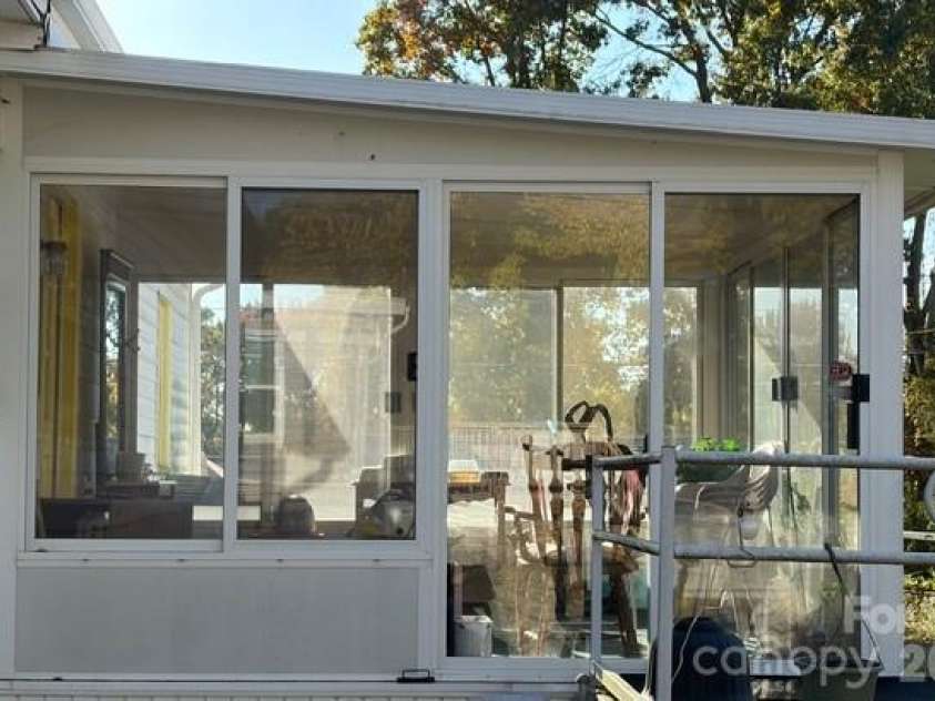 2126 Syracuse Drive, Charlotte, NC 28216.  MLS# CAR4316831, YatesRealty ID 14798. Sunroom