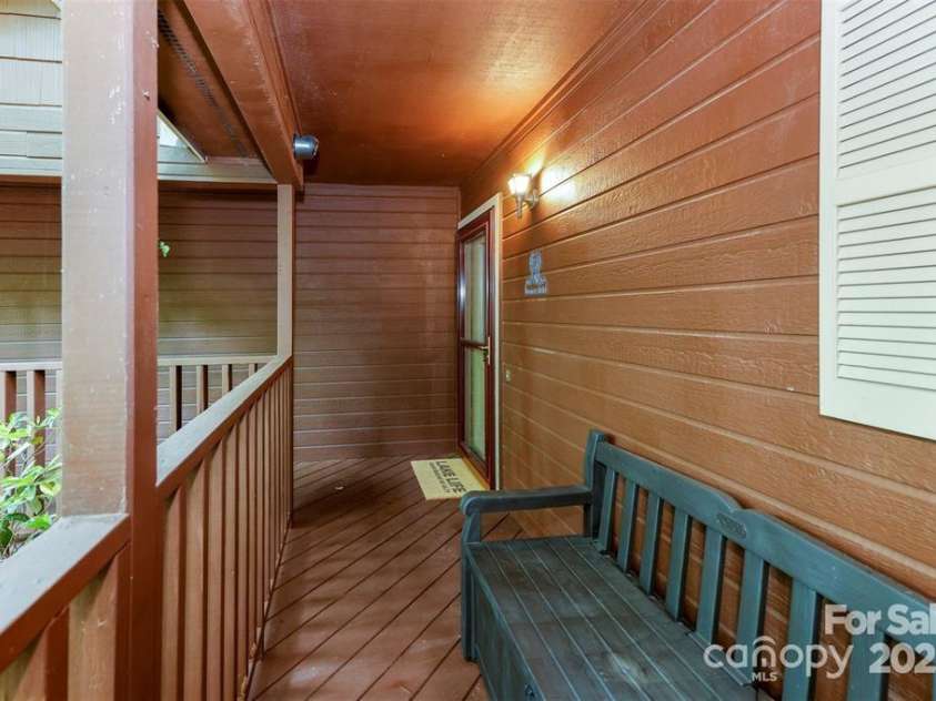 385 Whitney Boulevard, Lake Lure, NC 28746.  MLS# CAR4221622, YatesRealty ID 14799. 